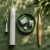 Why Dentists Still Disagree About Whether You Need an Electric Toothbrush
